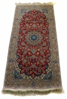 Lot 740 - 20th century silk and cotton Asian rug.