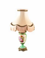 Lot 30 - Late 19th century green ground table lamp