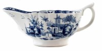 Lot 77 - Worcester sauceboat circa 1765, the reeded body