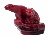 Lot 123 - Royal Doulton flambe polar bears.
