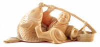 Lot 163 - 19th century Japanese ivory Okimono Ebisu with rod and sea bass