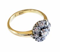 Lot 199 - Diamond flower head cluster ring, 18ct yellow gold shank, a total of 9 round old cut diamonds, total diamond weight of approx. 1.00ct, ring size N.