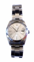 Lot 227 - Gents Rolex oyster date precision steel bracelet watch, round steel dial, applied batons, date window to 3 'o' clock, plain polished steel bezel surro