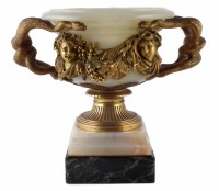 Lot 390 - A mid 19th century onyx and ormolu twin handle vase
