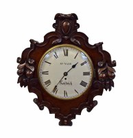 Lot 397 - A late 19th century stained oak wall clock.