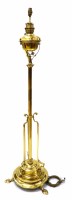 Lot 419 - Victorian floor standing brass lamp