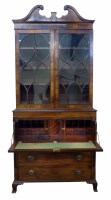 Lot 442 - George III mahogany bookcase on secretaire.