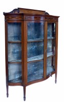 Lot 454 - Edwardian mahogany serpentine front display cabinet