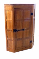 Lot 473 - Peter Rabbit Man Heap oak floor standing corner cupboard