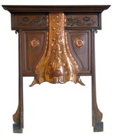 Lot 688 - Edwardian Arts & Crafts stained oak fireplace surround