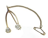 Lot 41 - Diamond two stone yellow gold brooch in the form of a wish bone