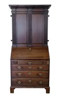 Lot 368 - George III mahogany bookcase on bureau.
