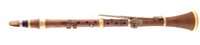 Lot 120 - Boxwood clarinet by Key London c.1850, with ivory fittings and brass keys, 59cm long