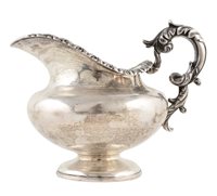 Lot 363 - A George III silver milk jug