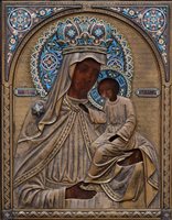 Lot 28 - A 19th century Russian cloisonné icon of the Virgin and Child.