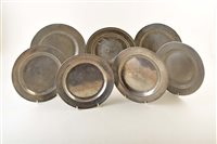 Lot 26 - A 17th century small pewter plate with touchmark of Edward Kent, London. 22.5 cm diameter. An 18th century pewter plate with the touchmark or WIlliam Cooke, Bristol and Gloucester. 13.5cm. An 18th...