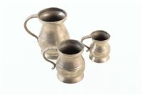 Lot 337 - Three Georgian graduated ballaster form pewter tankards. 1 pint, 1/2 pint and 1/4 pint.