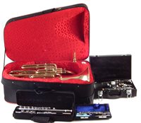 Lot 115 - Oswak India tuba in case, Ammoon clarinet in case, Blade piccolo and flute in cases