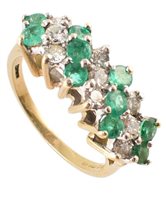 Lot 428 - Emerald and diamond 3-row boat shaped cluster ring