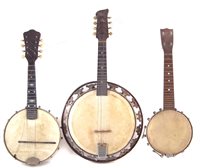 Lot 60 - Two Banjolins and a banjolele