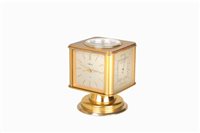 Lot 654 - A 20th century Art Deco swivel clock by Angelus.