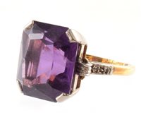 Lot 402 - Amethyst single stone 18ct gold ring with diamond set shoulders