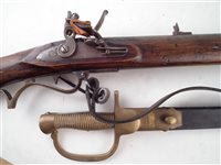 Lot 133 - Replica Baker rifle and sword bayonet.