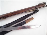 Lot 133 - Replica Baker rifle and sword bayonet.