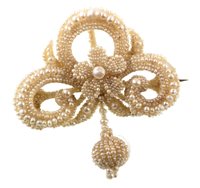 Lot 391 - Victorian natural seed pearl flower head and scroll drop brooch