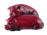Lot 206 - Royal Doulton Flambe pigs