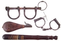 Lot 101 - Lignum Vitae truncheon painted with a crown above Staffordshire knot together with two pairs of hand cuffs and a powder flask
