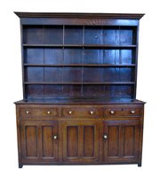 Lot 696 - George III oak dresser.