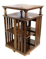 Lot 689 - Edwardian revolving bookcase.