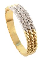 Lot 29 - A diamond hinged bangle