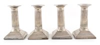 Lot 340 - Four silver dwarf candlesticks by William Hutton & Sons