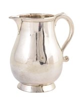 Lot 352 - Georgian silver sparrow beak jug