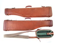 Lot 32 - Two leg of mutton gun cases and a cartridge case