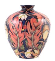 Lot 247 - Moorcroft vase, decorated with an acorn design