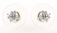 Lot 45 - Diamond solitaire 18ct white gold studs